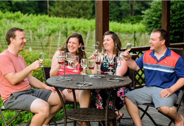 People enjoying wine image